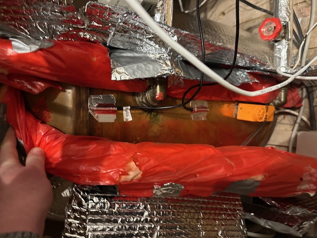 Tank insulation peeled back